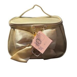 Juicy Couture Elegant Gold Bow travel cosmetic bag